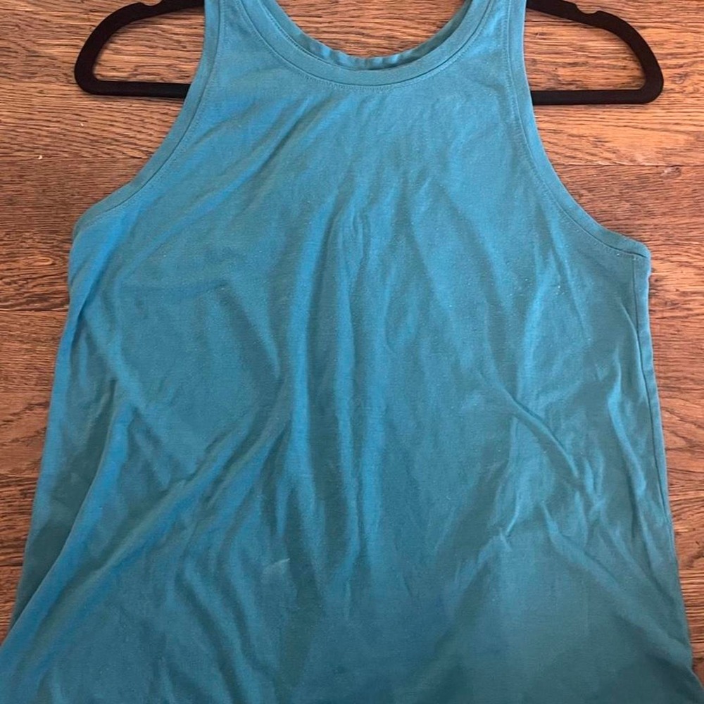 Old Navy blue tank top in size S - has a tiny discolor mark on front